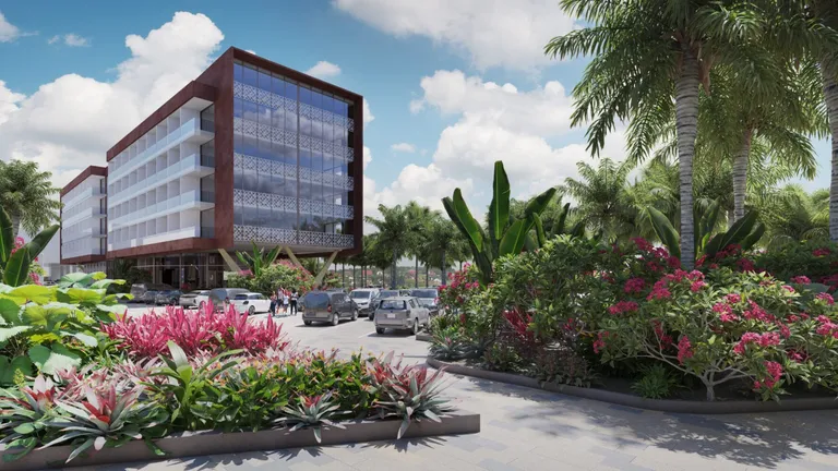 Render of the Pacific Town Centre hotel: a five-storey building with a patterned screen facade seen across tropical planting