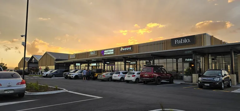 The Sands retail terrace at sunset, with GLO, Anytime Fitness, Ali Baba’s House and Pablo tenancies
